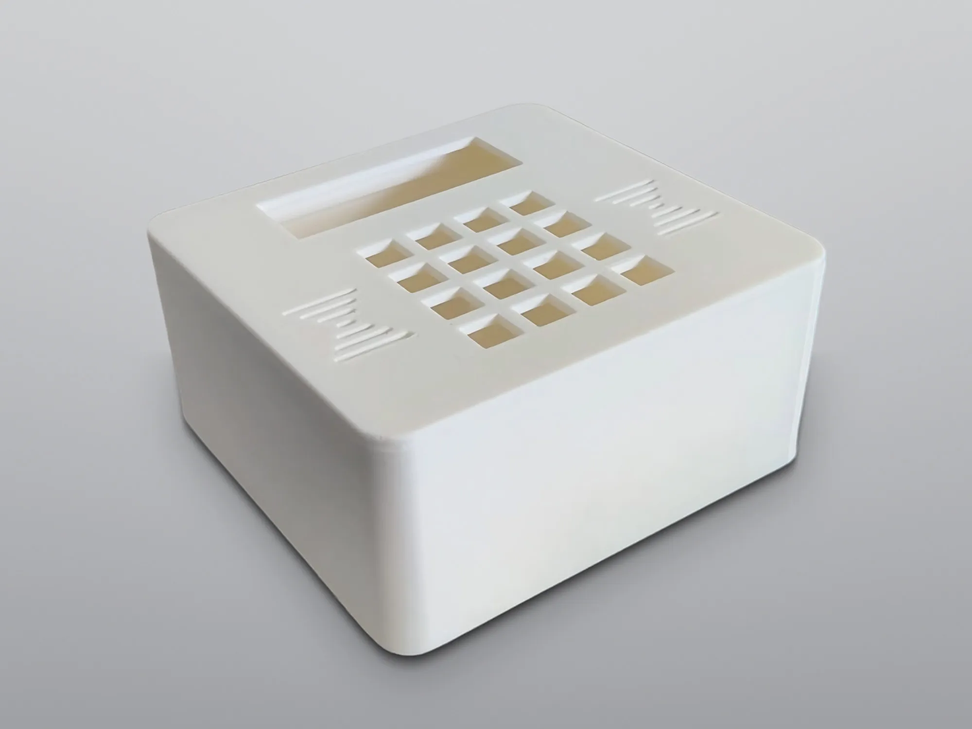 White 3D-printed ABS enclosure with a keypad cut-out