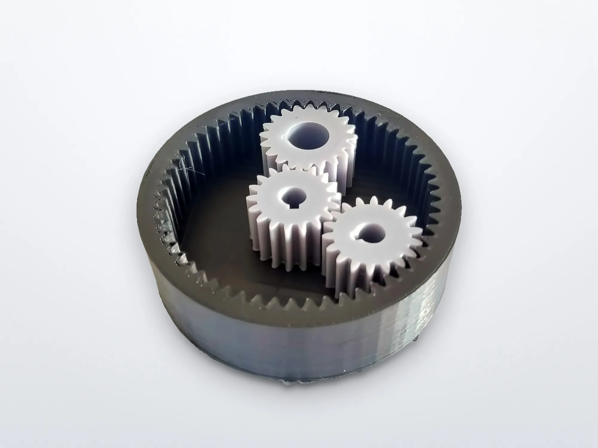 3D-printed planetary gear set with ring gear and three planet gears
