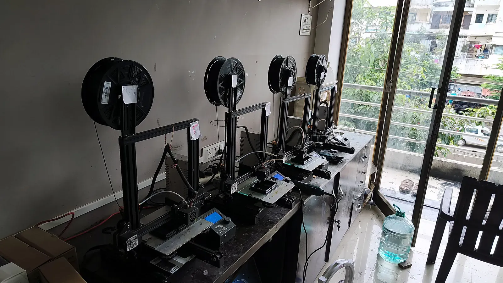 Row of FDM 3D printers working in the AURO3D print room